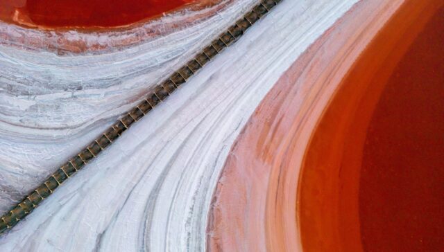 an aerial view of a red and white landscape